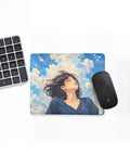 Cloud Nine mouse pad: anime girl among blue-sky clouds, on a desk