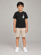 Little Kaavo kids crew tee in black, small duck pocket print, worn by a young boy, front view